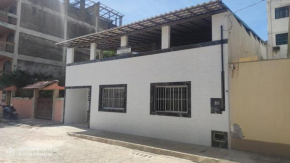 Casa de 04 quartos à 50 metros da praia central de Marataizes